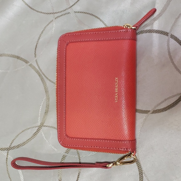 Vera Bradley Handbags - This is a Vera Bradley wristlet authentic. Burnt orange color and texture.